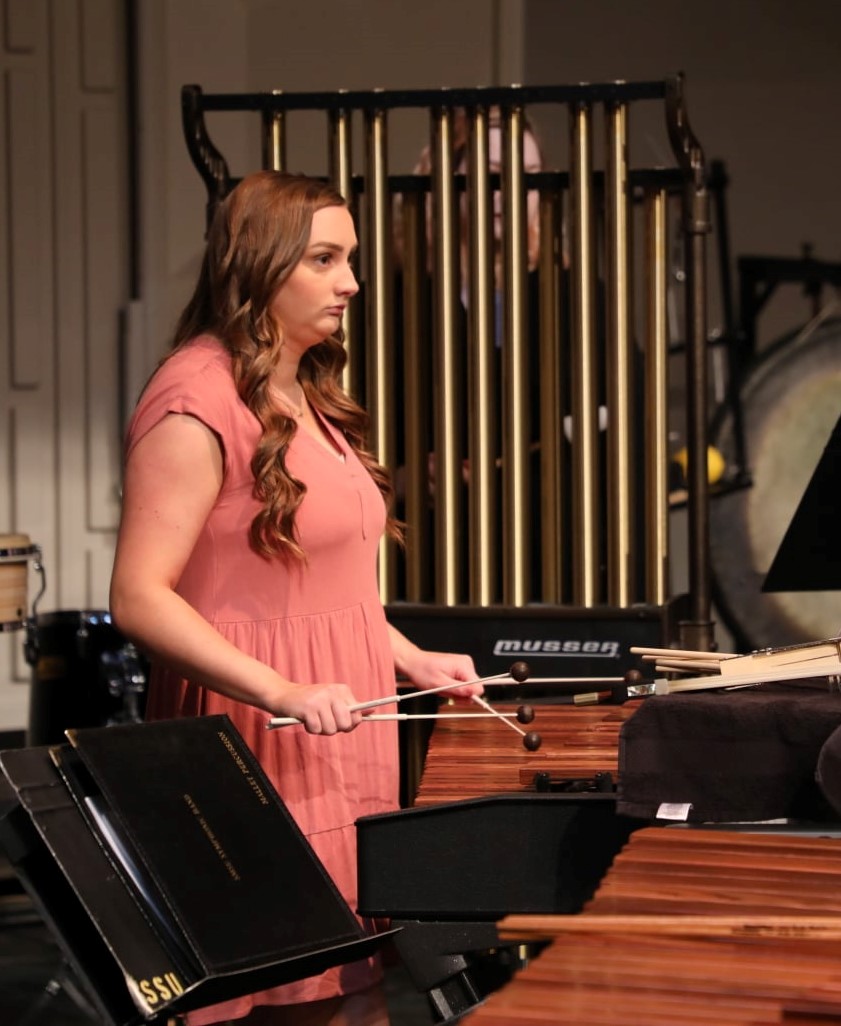 picture of a percussionist performing with the Concert Band