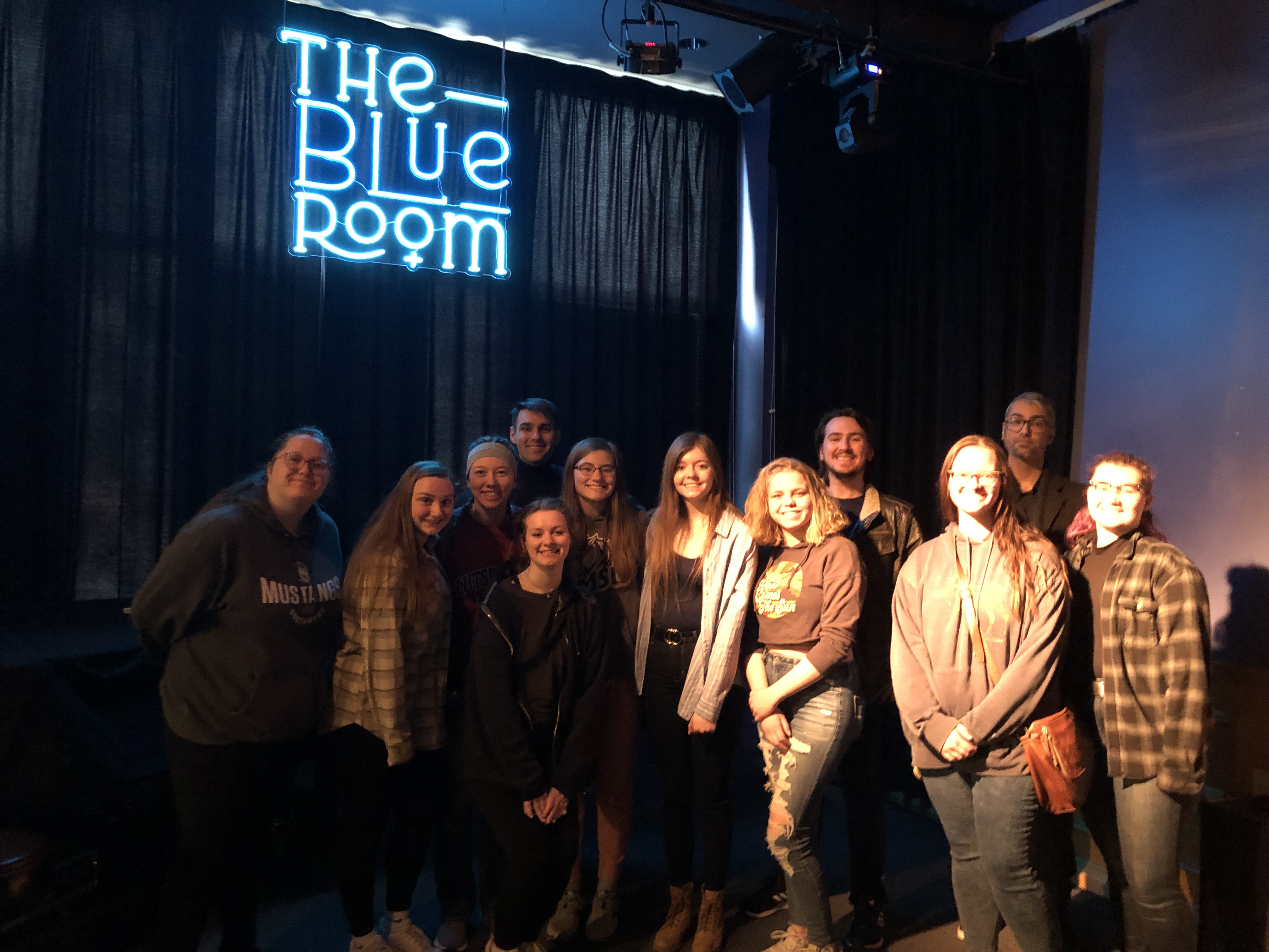 Several jazz ensemble members posing on stage at the Blue Room in Kansas City, Missouri
