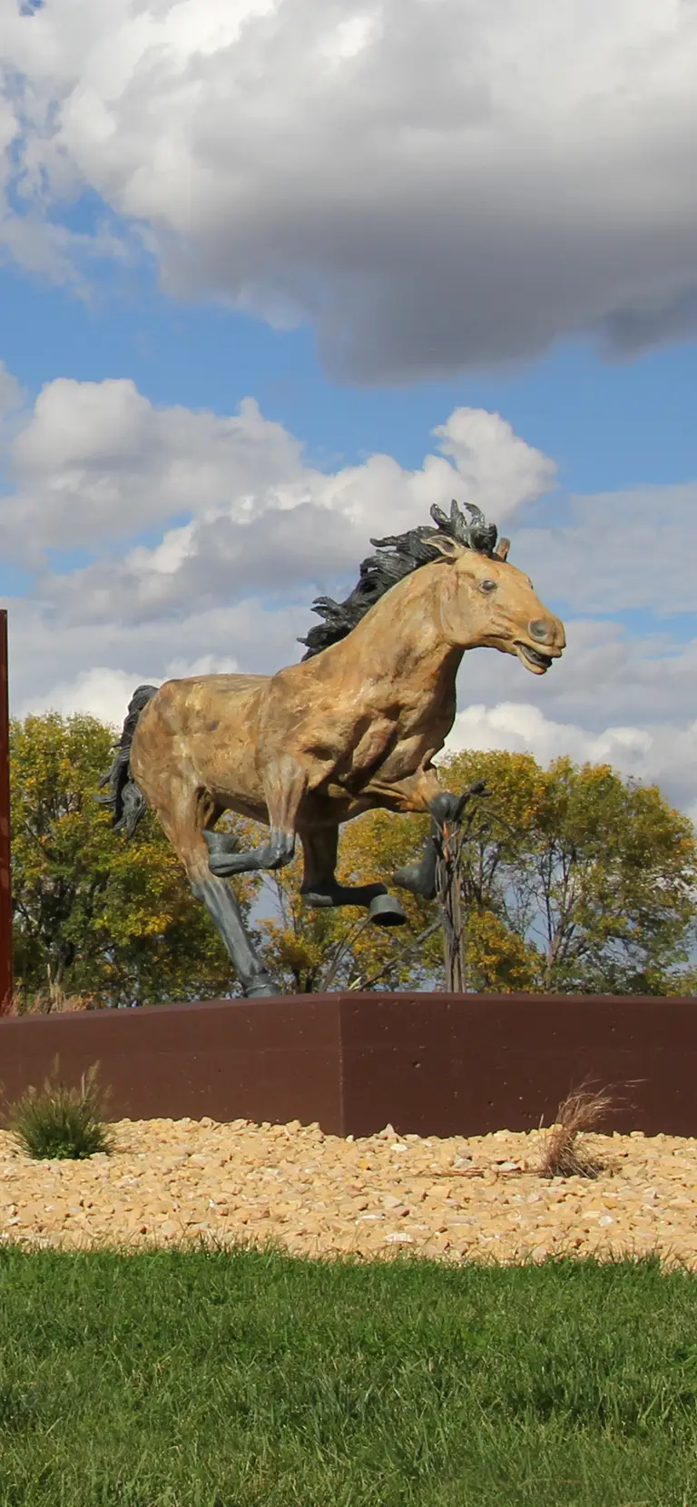 alondra leon flores in the library and smsu entrance