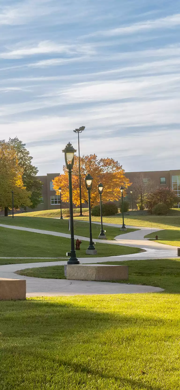 smsu student in front of the BA link entrance