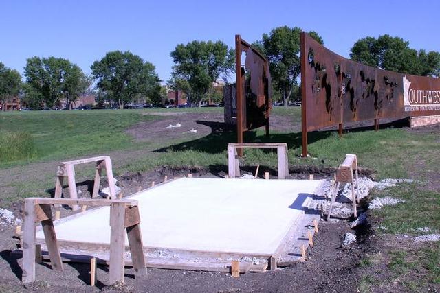 The Mustang will be placed on footings which were recently poured