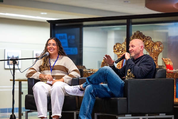 Seely Stockmoe, left, leads the conversation with Coach Tom Webb